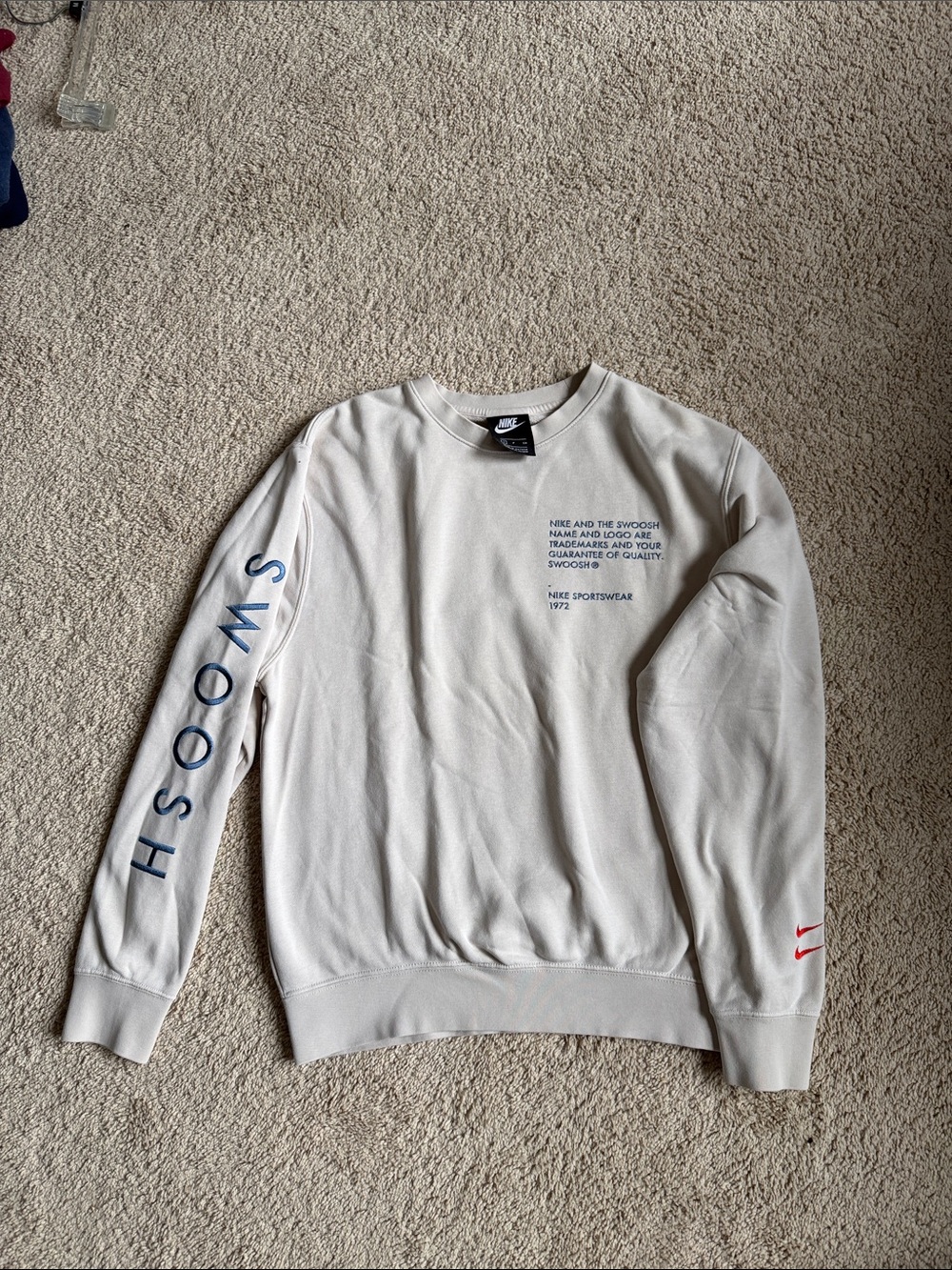 Nike Men's Cream Crewneck Sweatshirt with Blue Sleeve Lettering and Red Swoosh